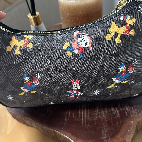 Coach Brown Signature Canvas Disney Holiday Wristlet with Gold Hardware - Picture 3 of 4